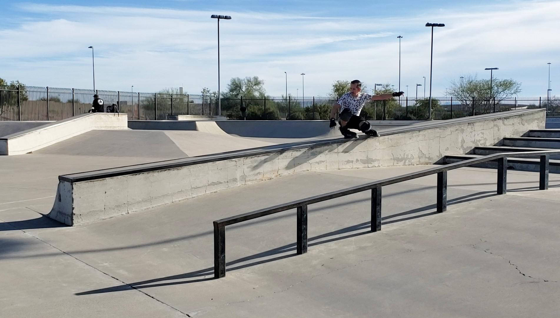 Youthful Enthusiasm: Boy Rollerblading At Skate Park