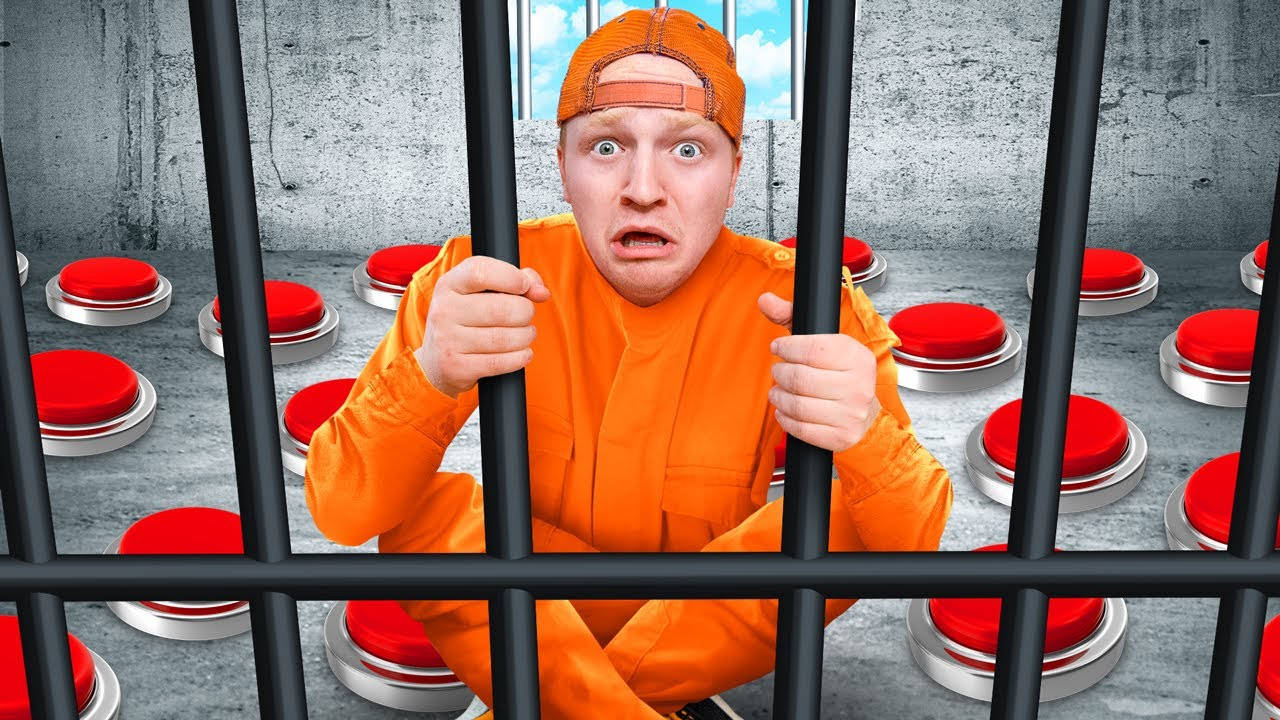 Youtuber Unspeakable In Jail With Red Buttons Background