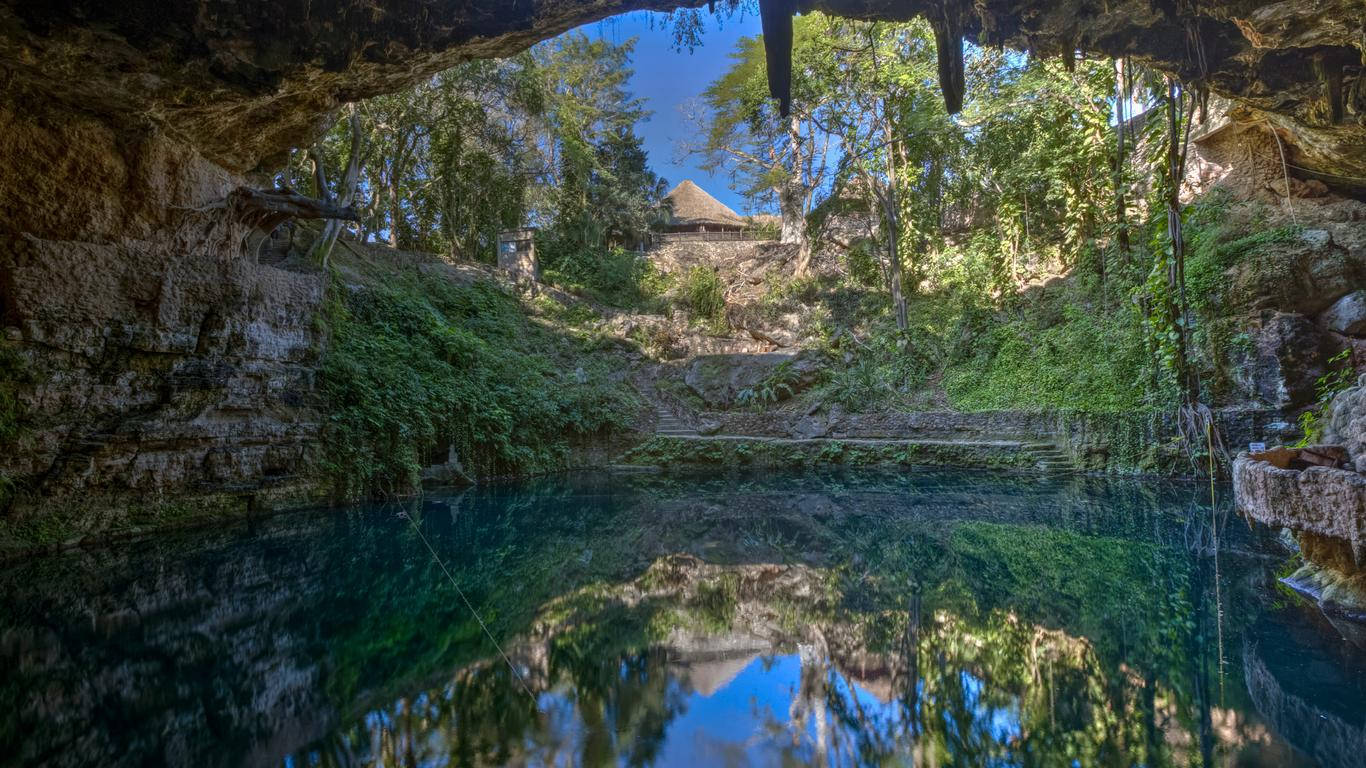 Yucatan Cenote With Hut Background