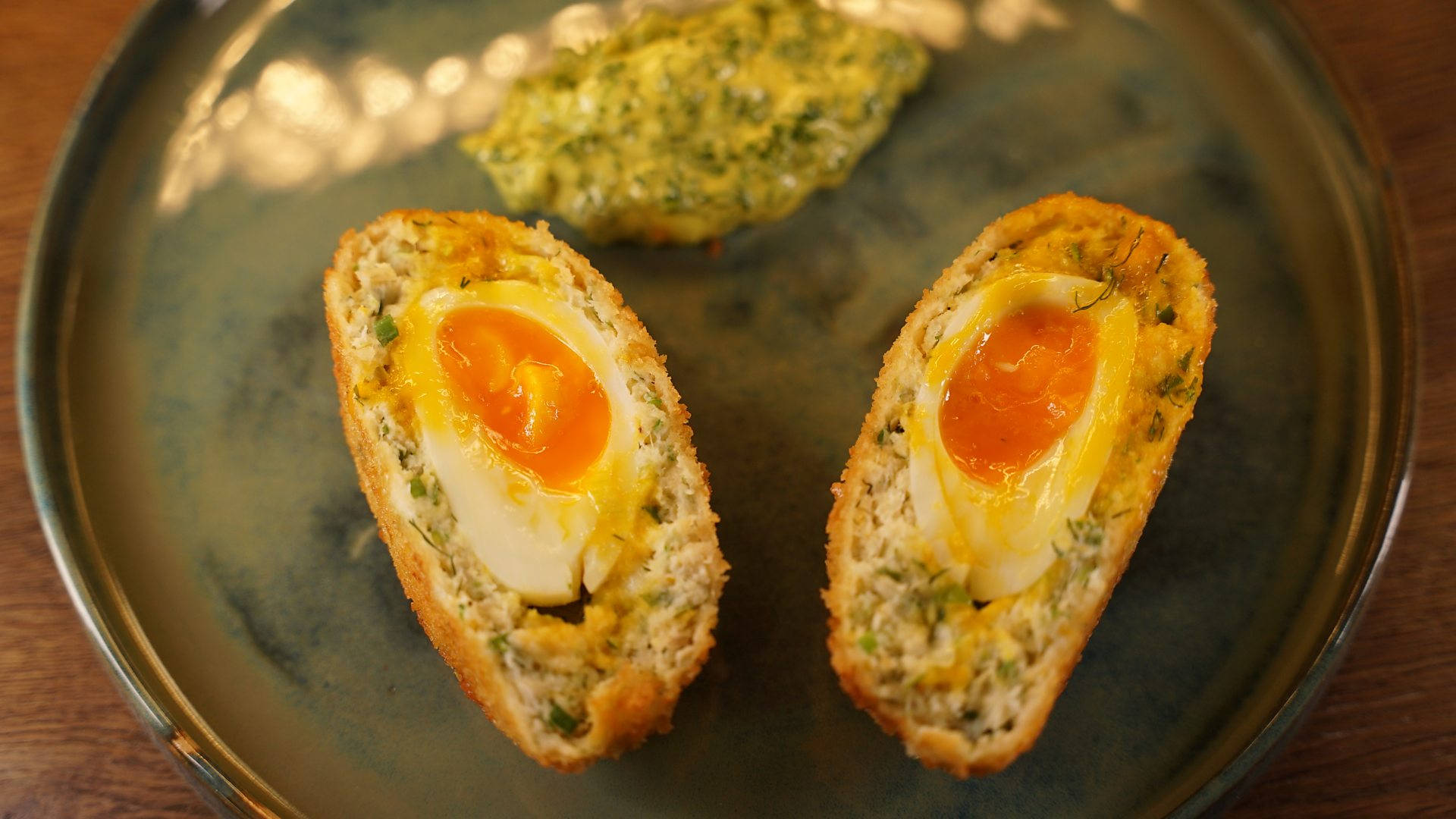 Yummy British Scotch Egg Dish With Runny Yolk Background