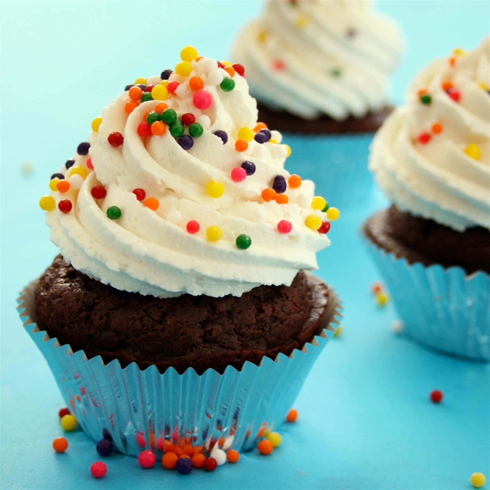 Yummy Cupcake With Cream And Sprinkles Background