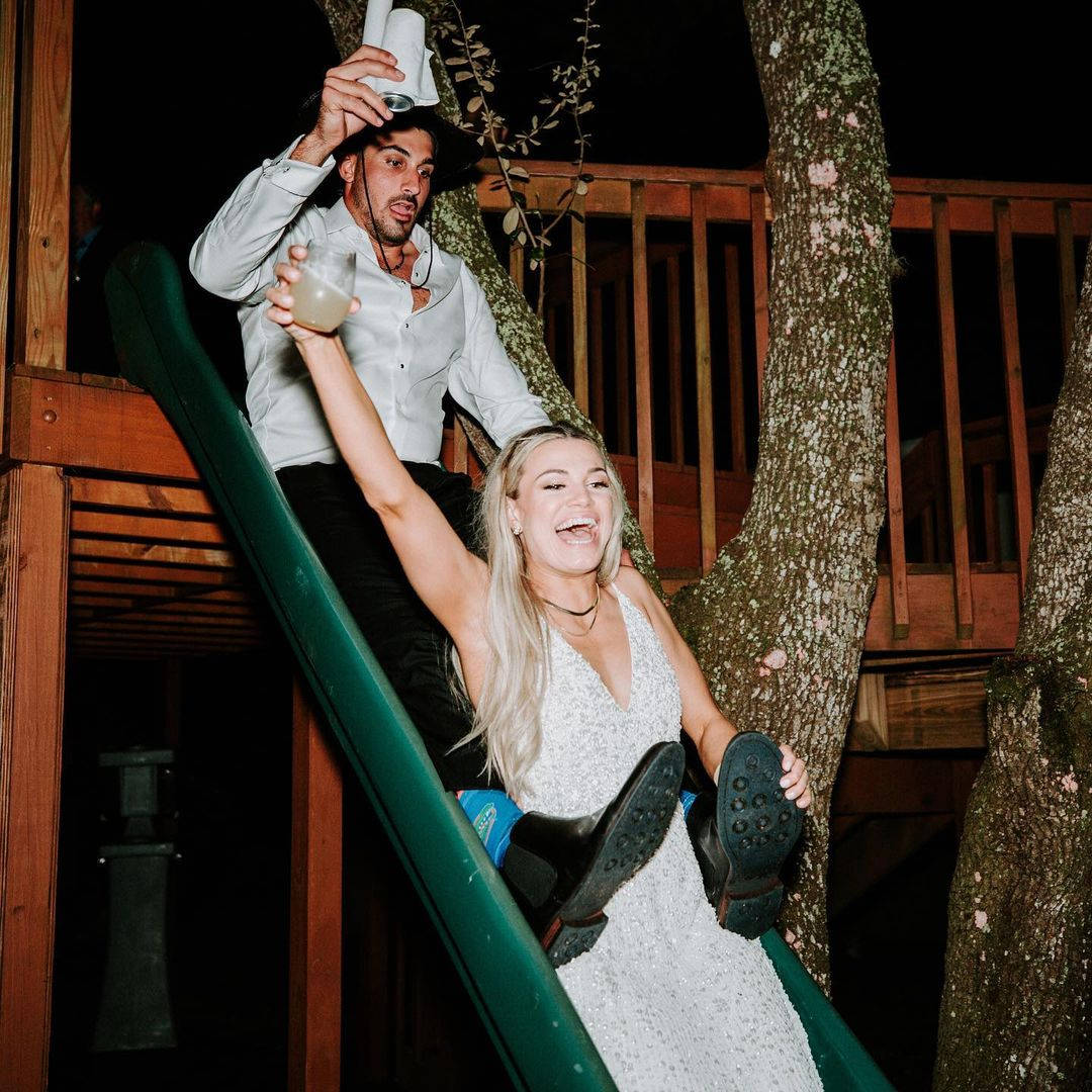 Zach Eflin And Wife On Slide Background