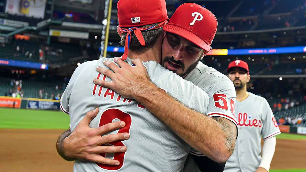 Zach Eflin Hugging His Teammate Background