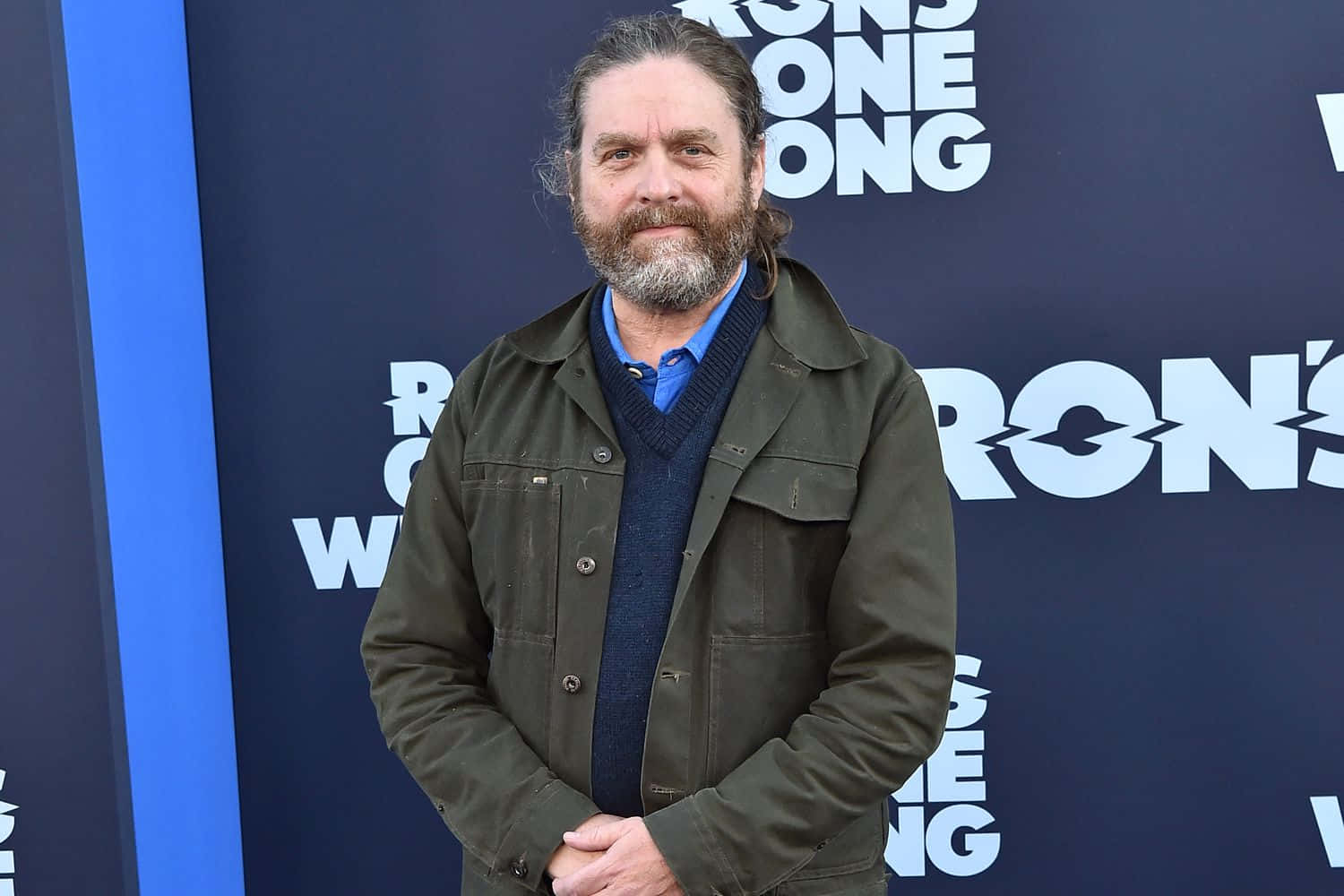 Zach Galifianakis Looking Cheerful Background