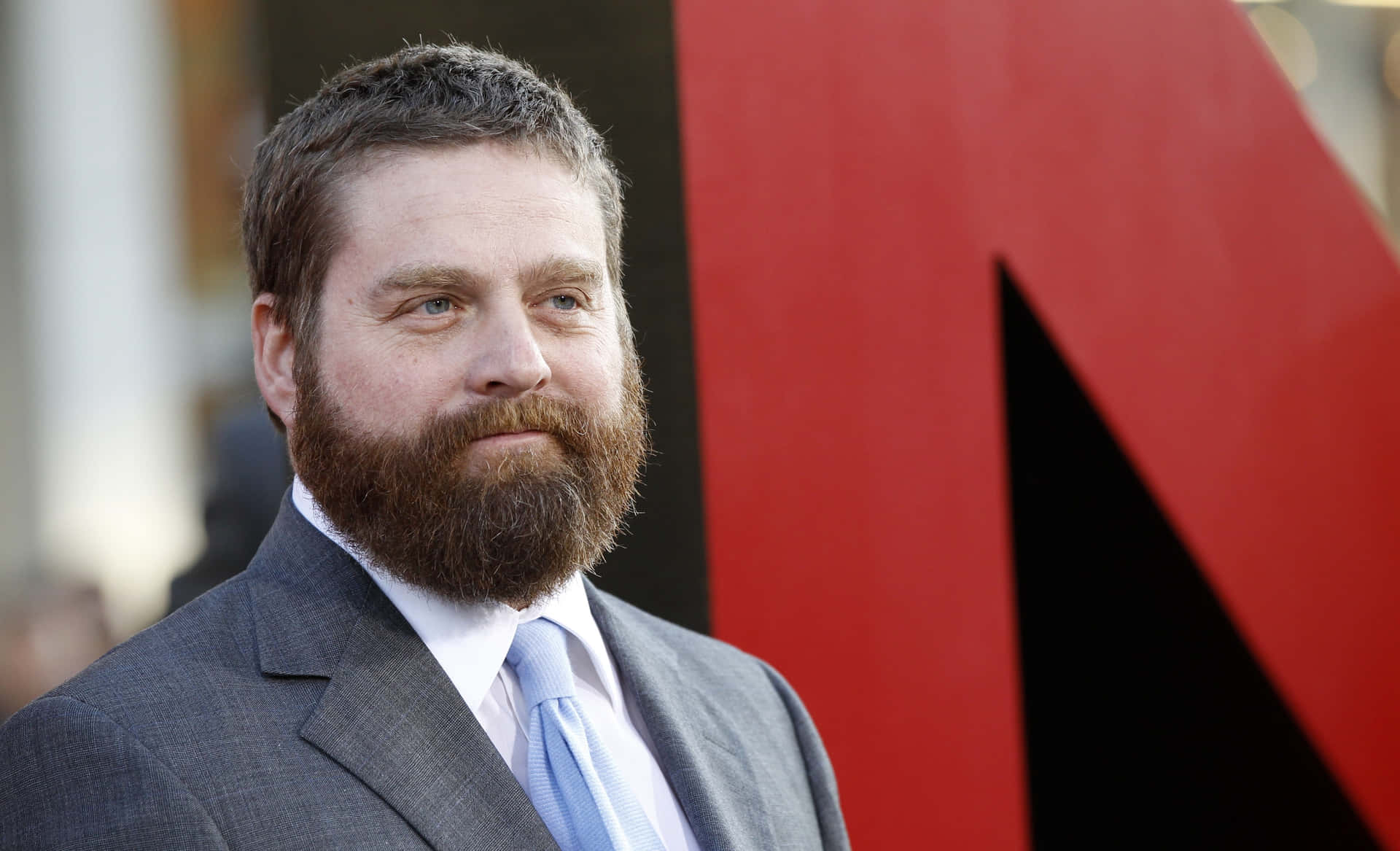 Zach Galifianakis Smiling For The Camera Background