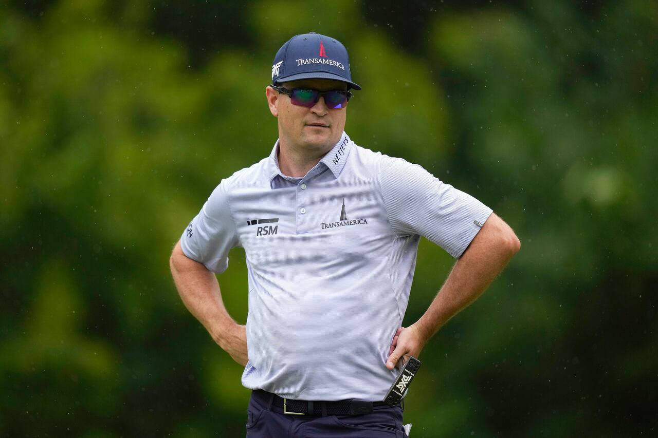 Zach Johnson Hands On Hip Background