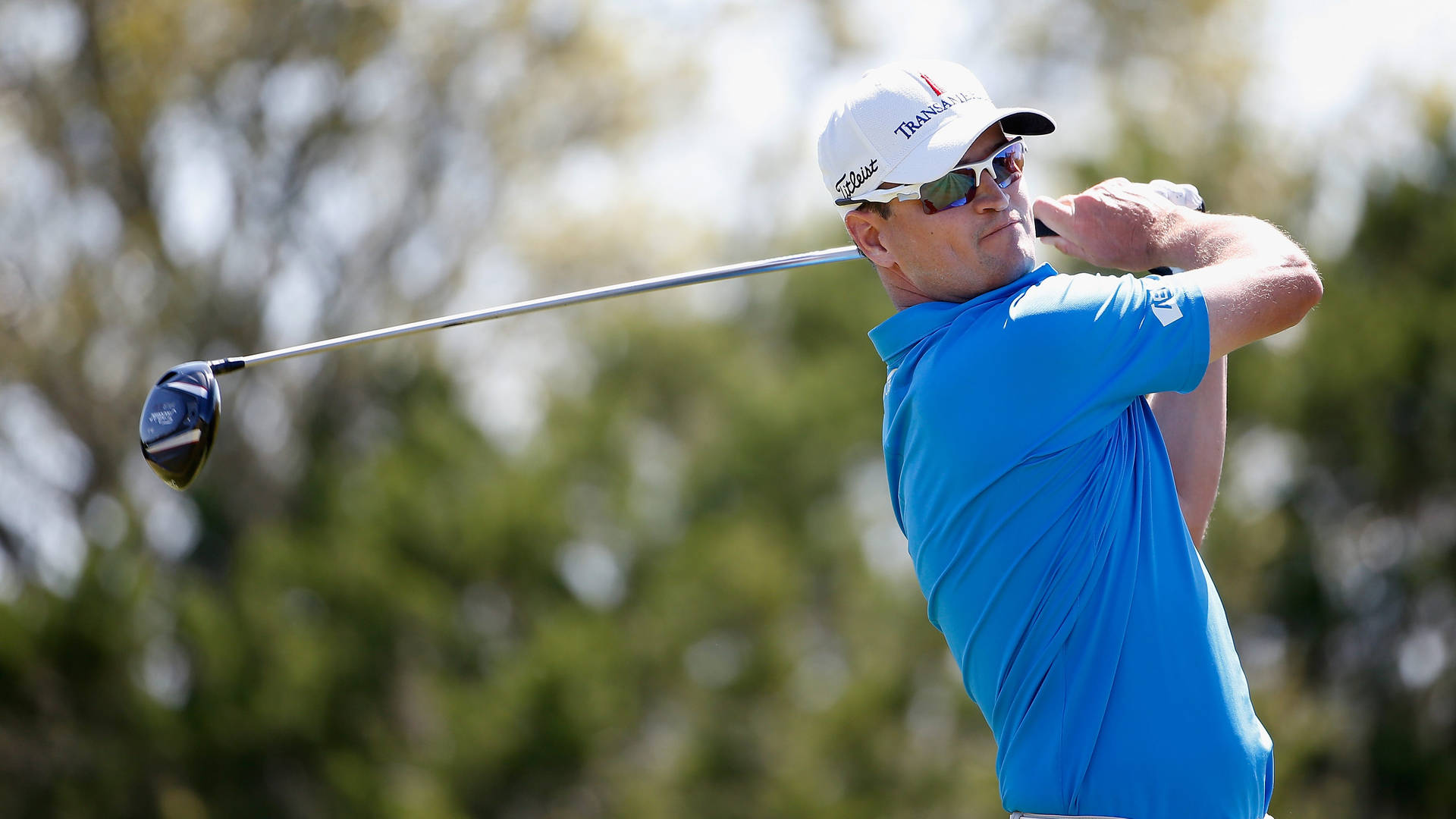 Zach Johnson In Blue Shirt Background