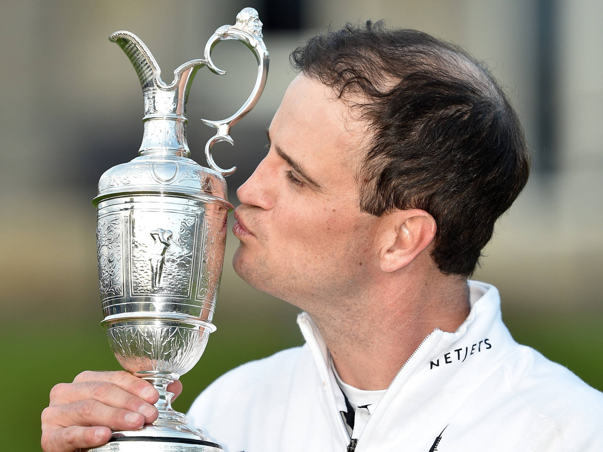 Zach Johnson Kissing Trophy Background