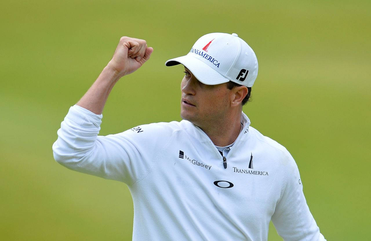 Zach Johnson Raising His Arm Background