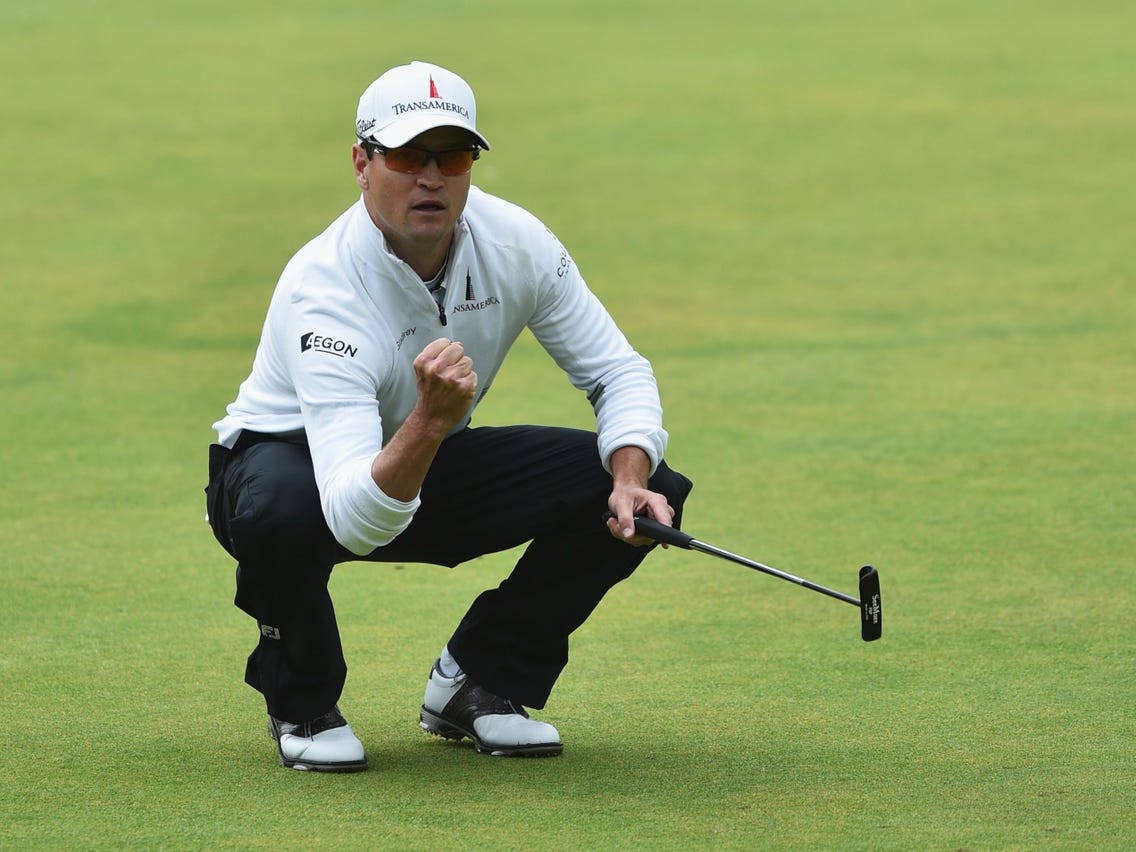 Zach Johnson Sitting On Golf Course Background