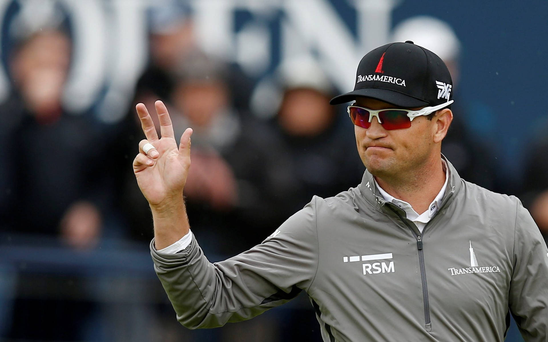 Zach Johnson Waving To Fans Background