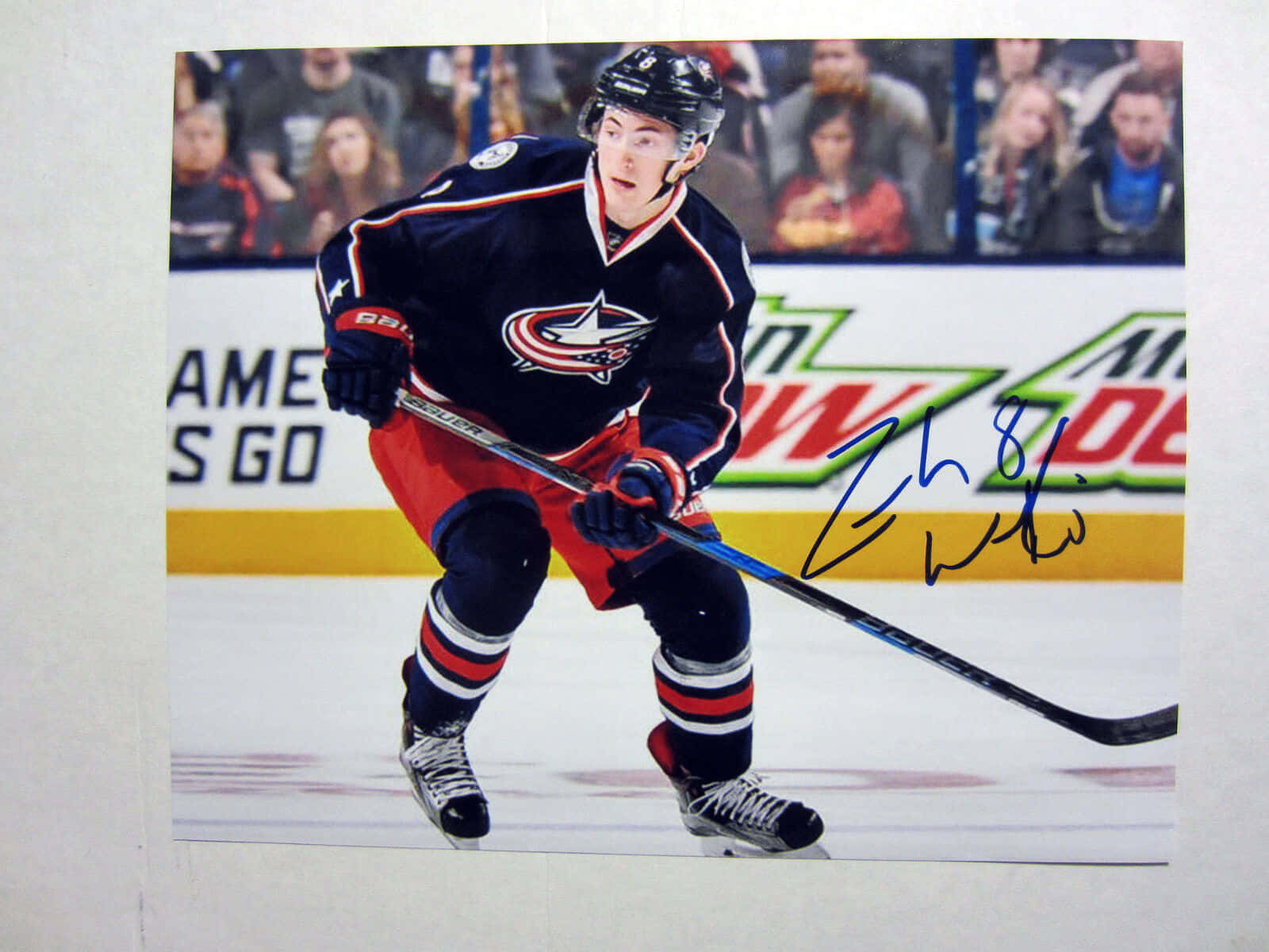 Zachary Werenski Of The Blue Jackets In Action Background