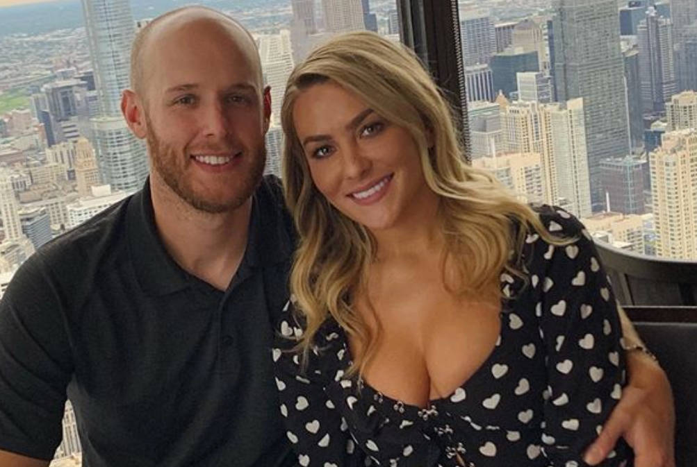 Zack Wheeler And His Wife Enjoying A Happy Moment Background