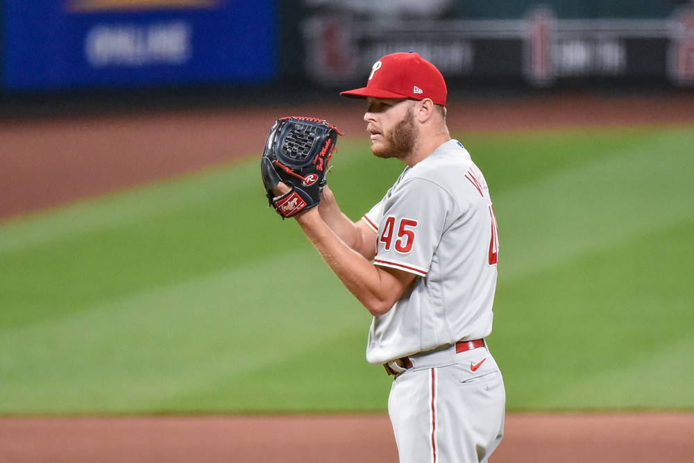 Zack Wheeler Holding Ball In Mitt Background