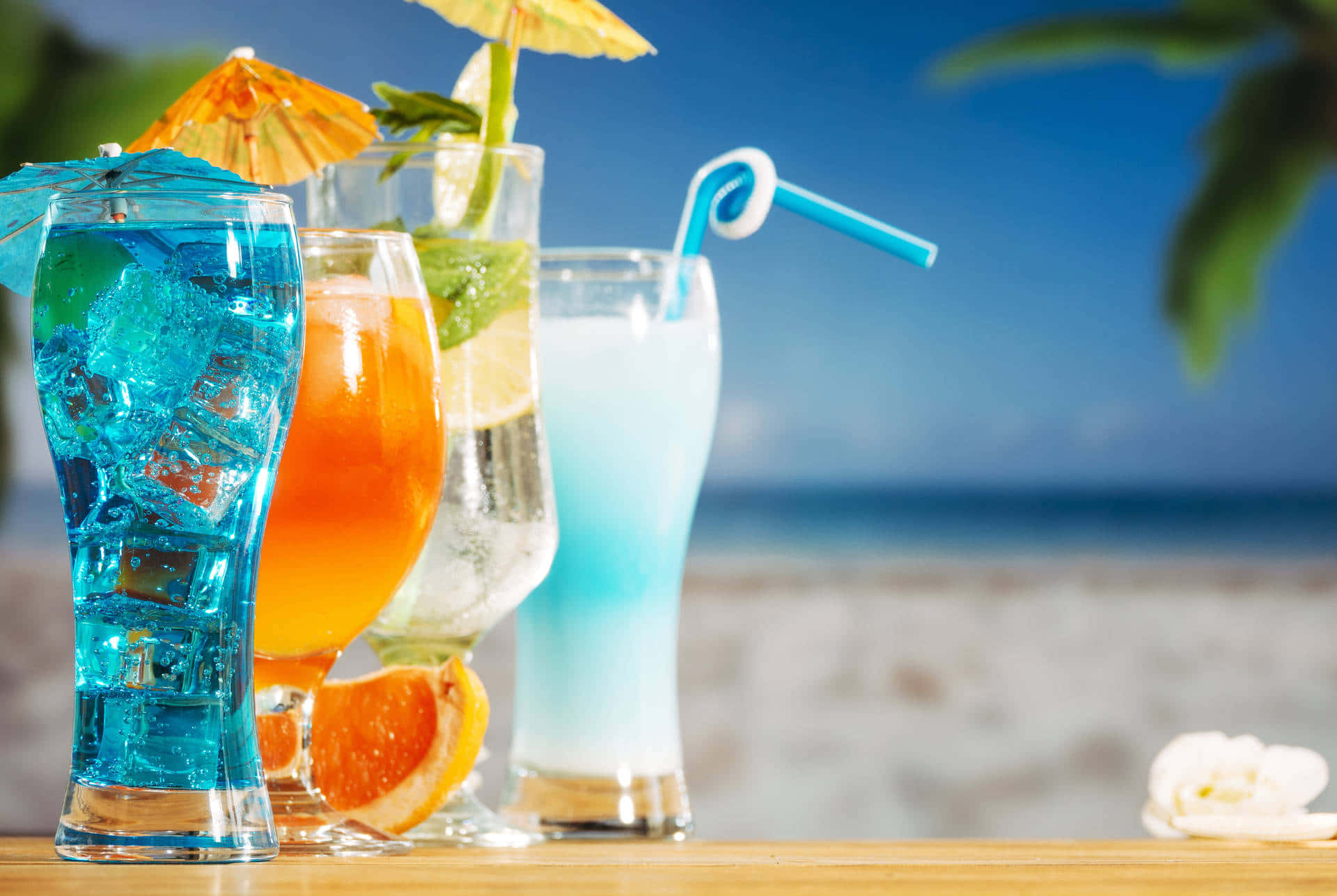 Zesty Cocktails By The Beach Background