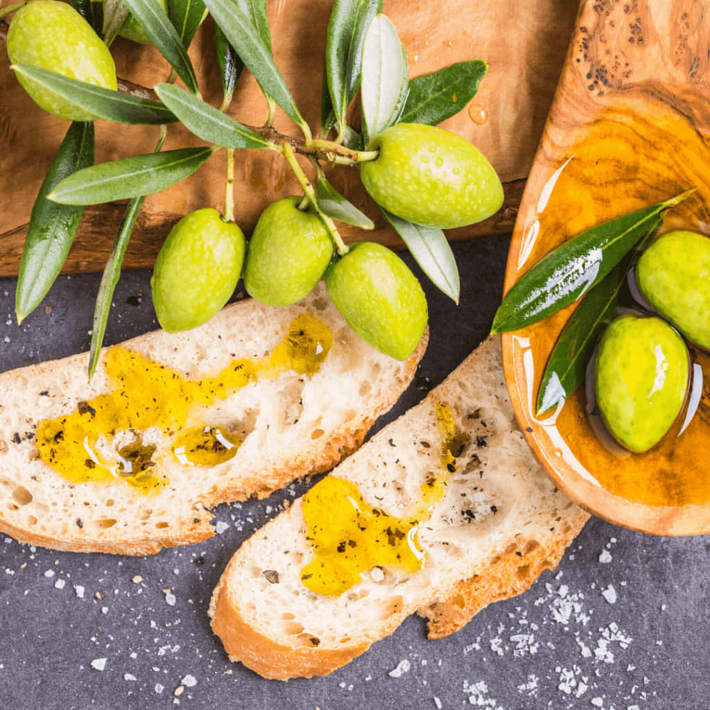 Zesty Fruits And Toasted Bread Background