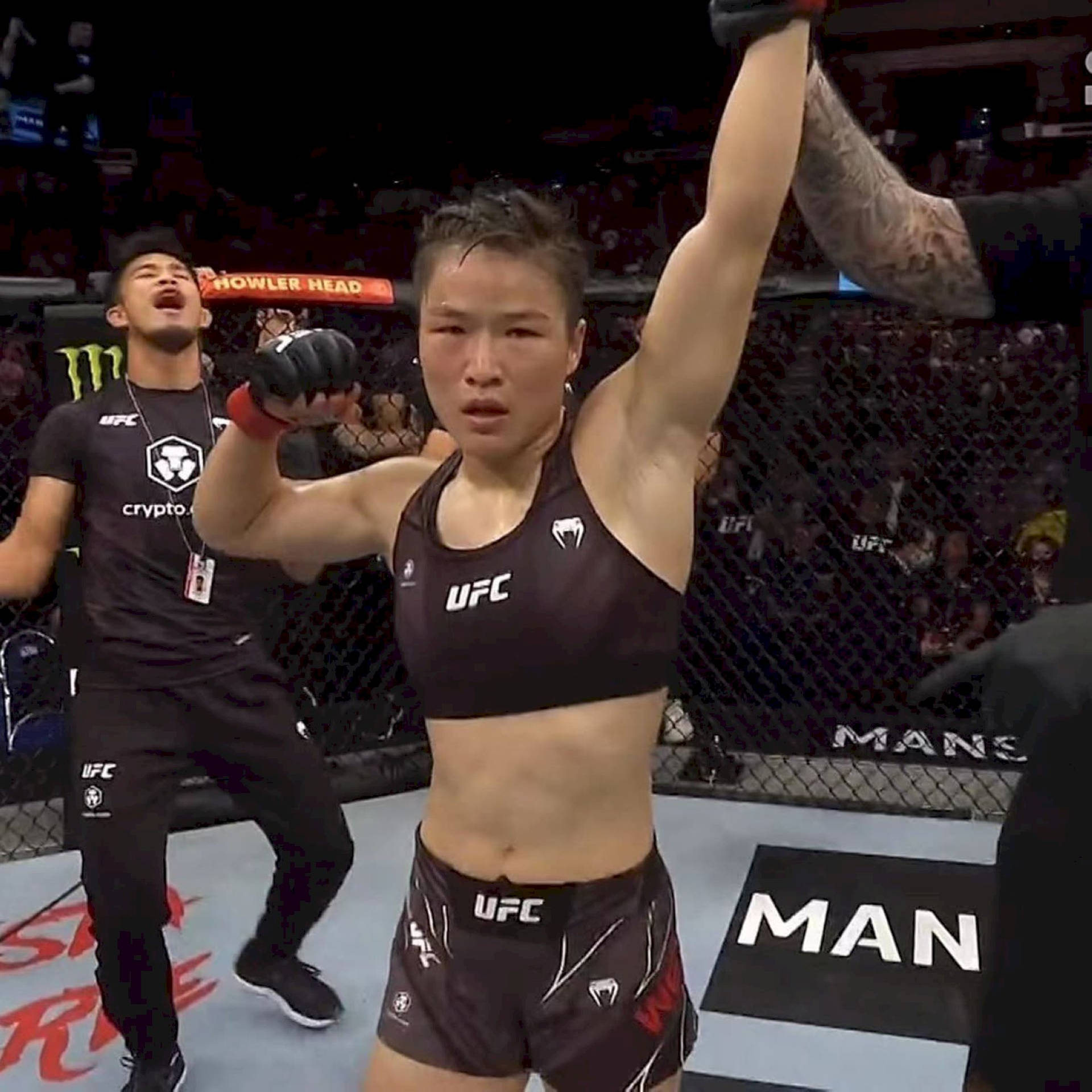 Zhang Weili Hand Raised After Fight Background