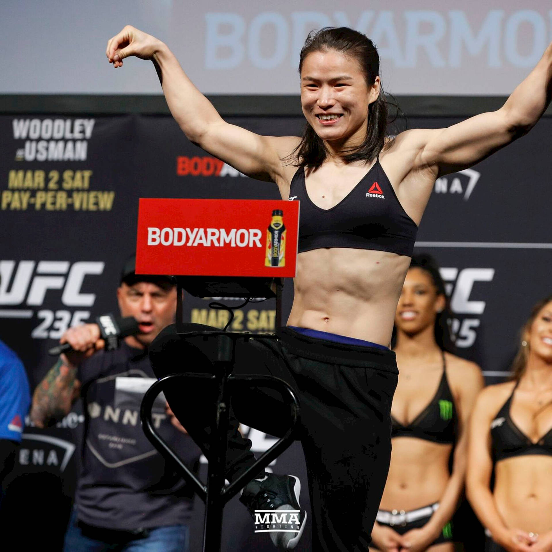 Zhang Weili Posing During Press Conference Background