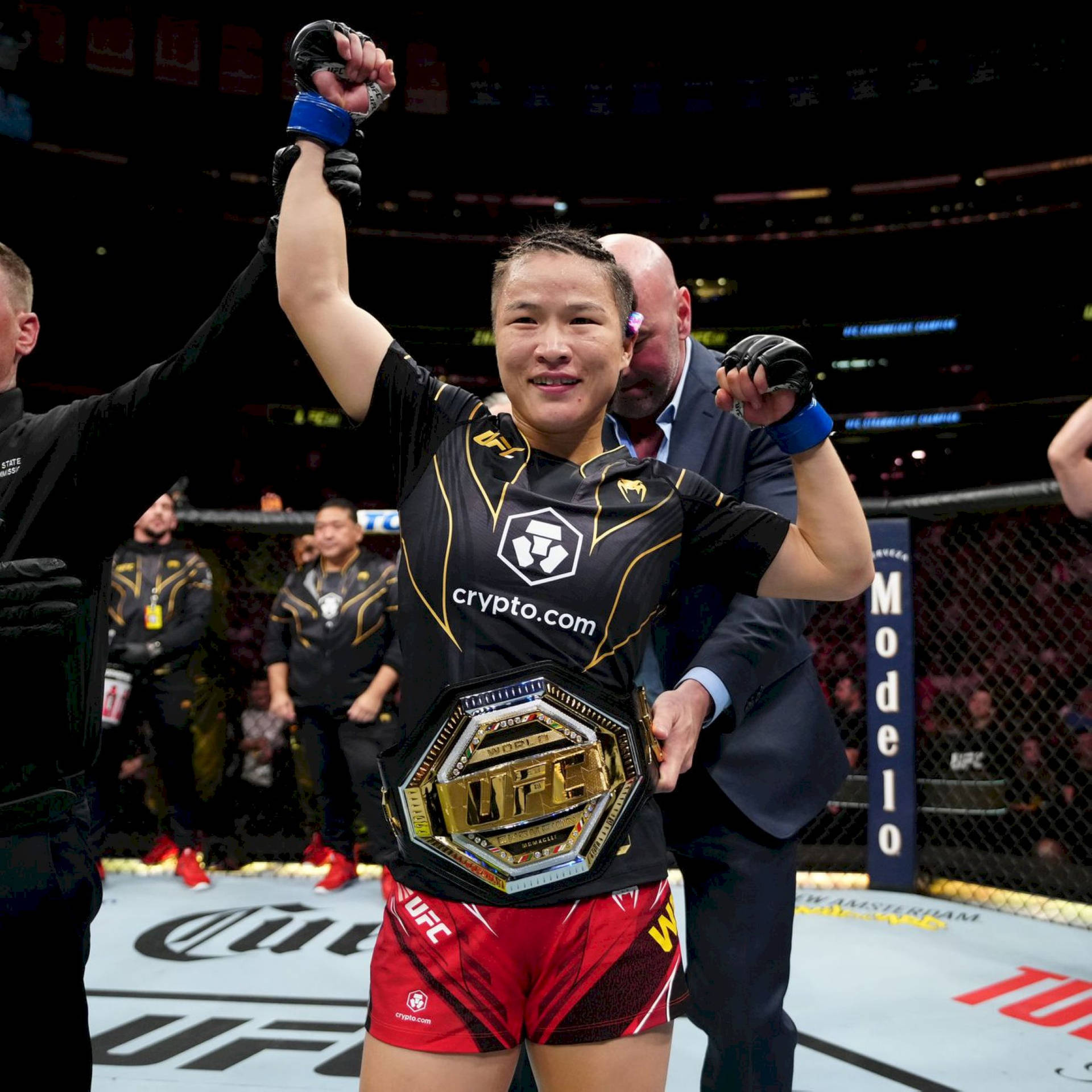 Zhang Weili With Winning Belt Background