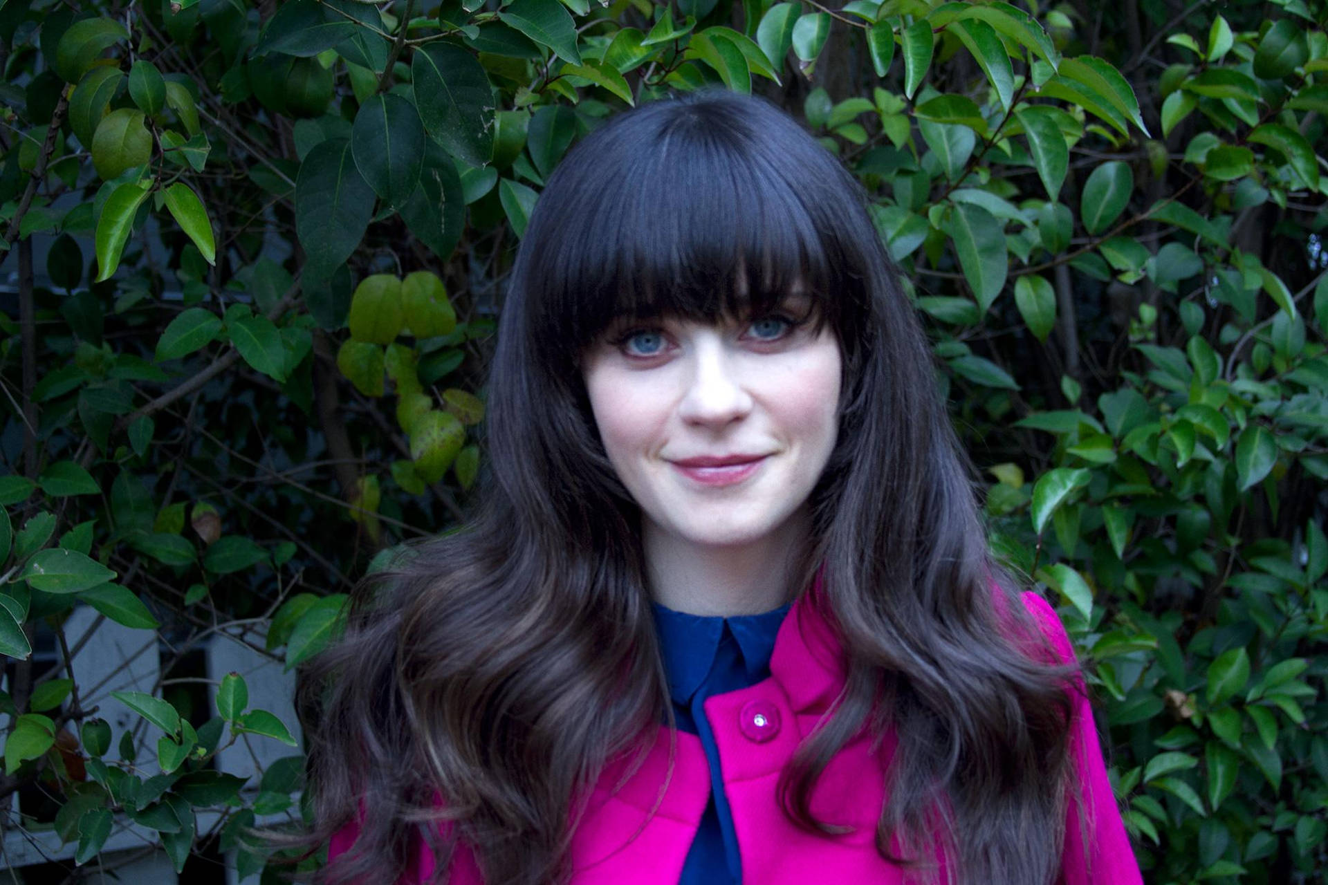 Zooey Deschanel Pink And Blue Outfit With Plants