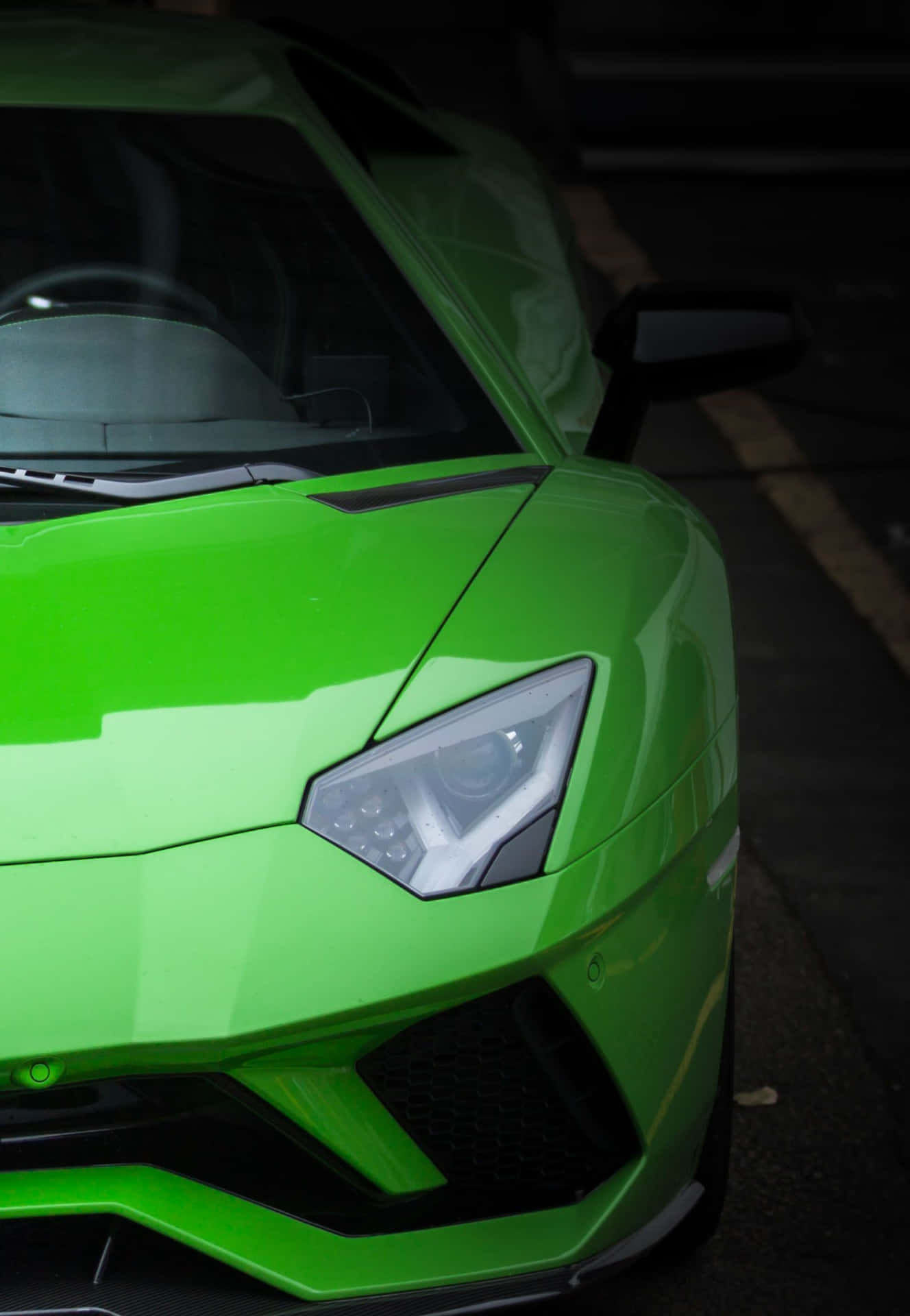 Zoom Into Luxury: An Up Close Look Of A Green Lamborghini. Background