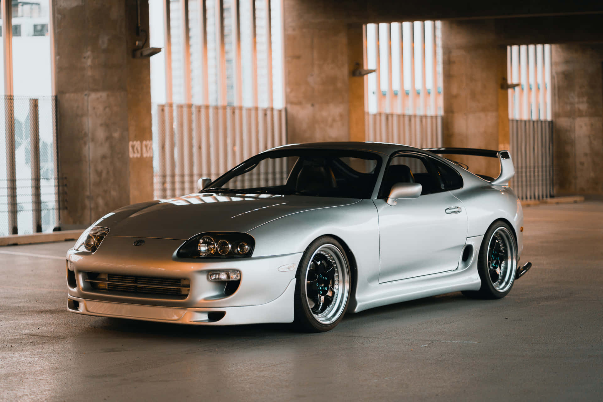 Zoom Past In Style With A Toyota Supra Background