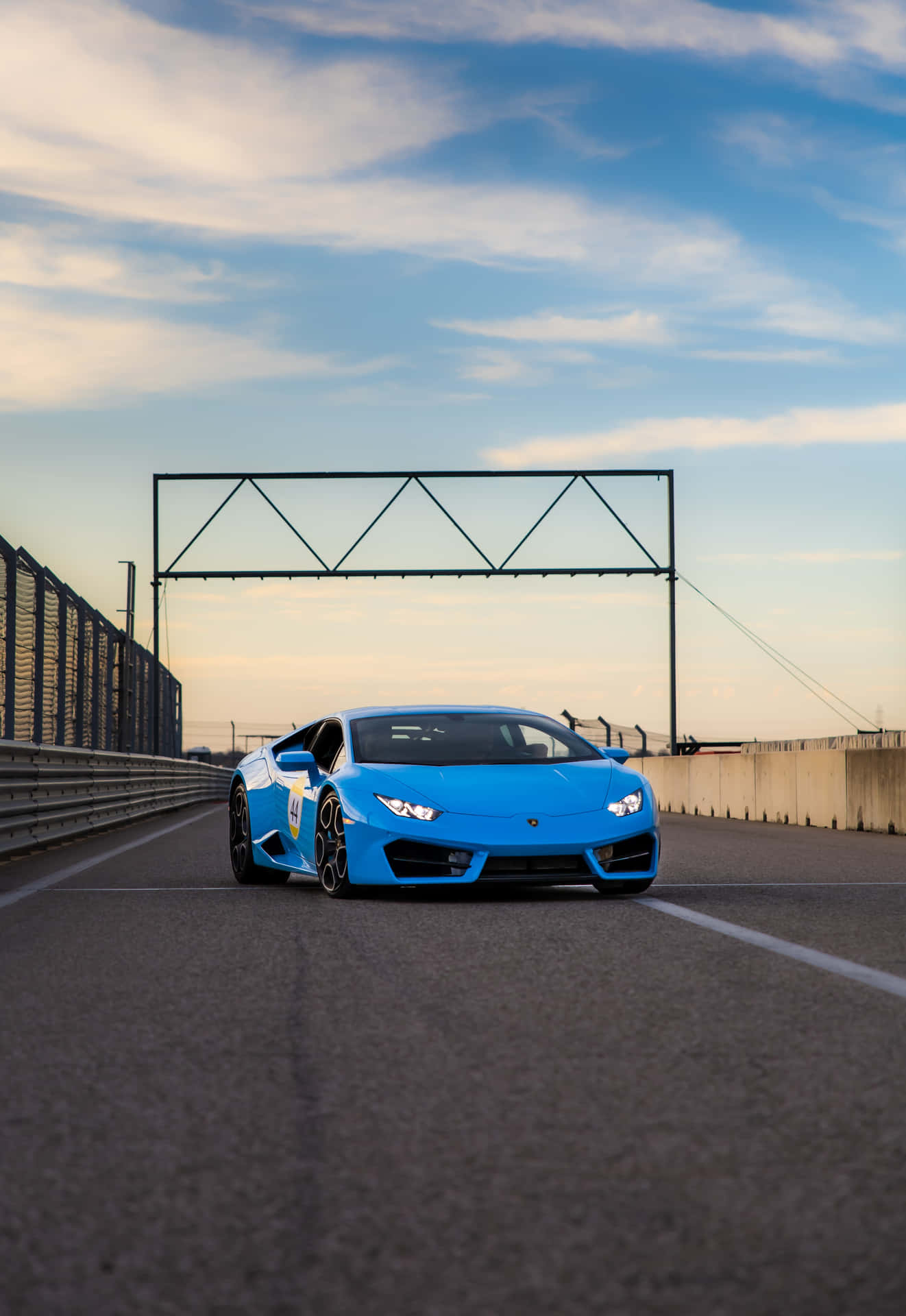 Zoom Past The Competition With A Stylish Blue Lamborghini. Background