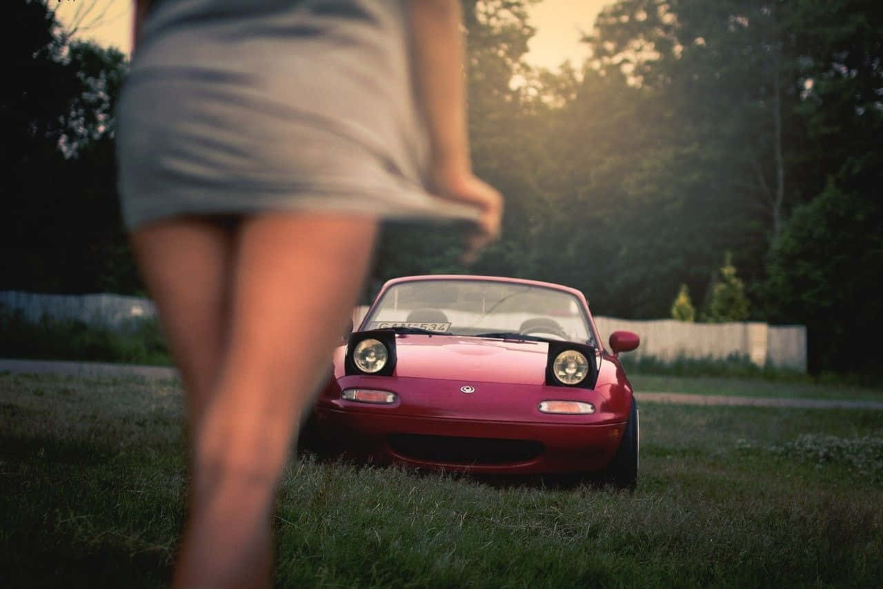 Zoom Through The City In Mazda's Mx-5 Miata Background