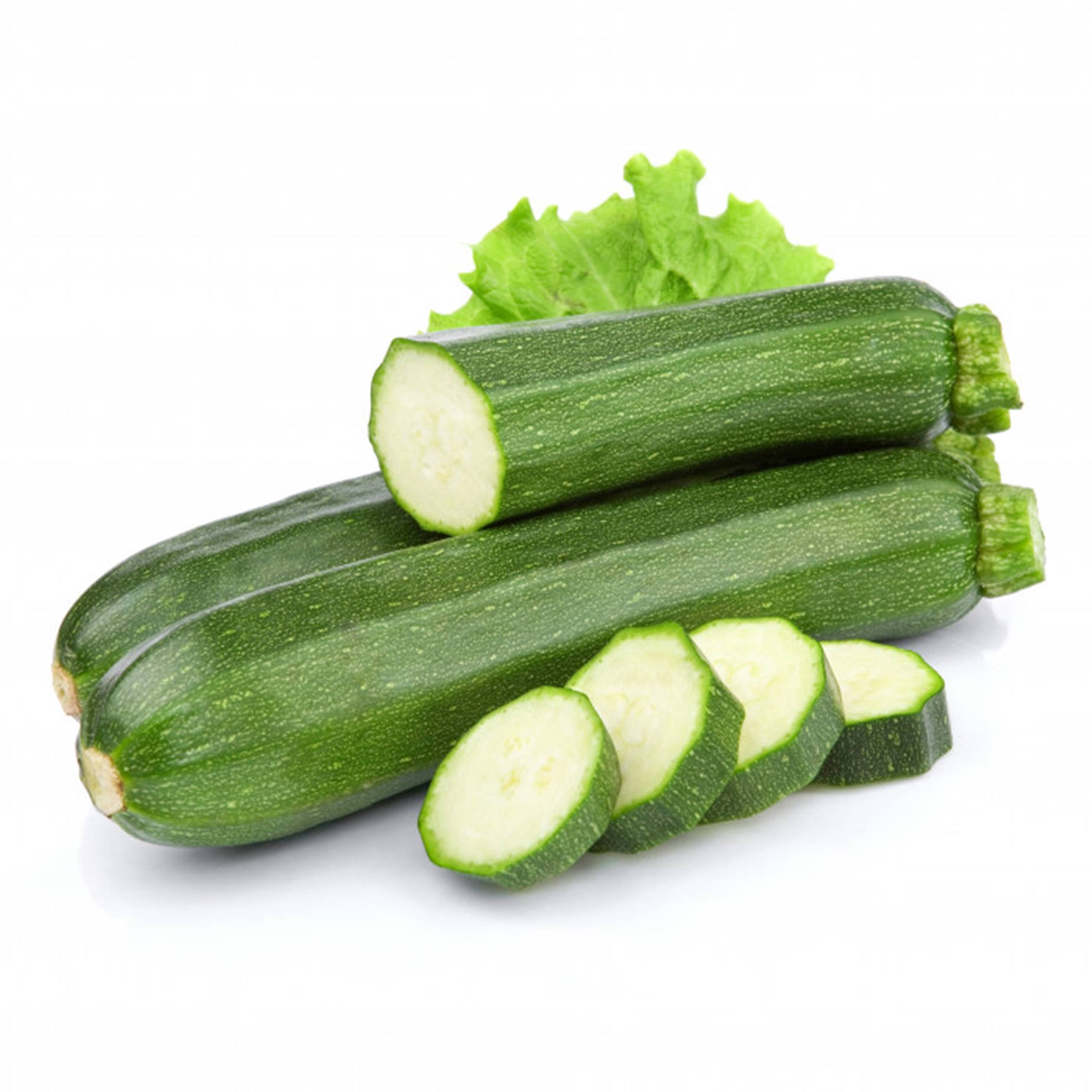 Zucchini Slices And Green Lettuce Background