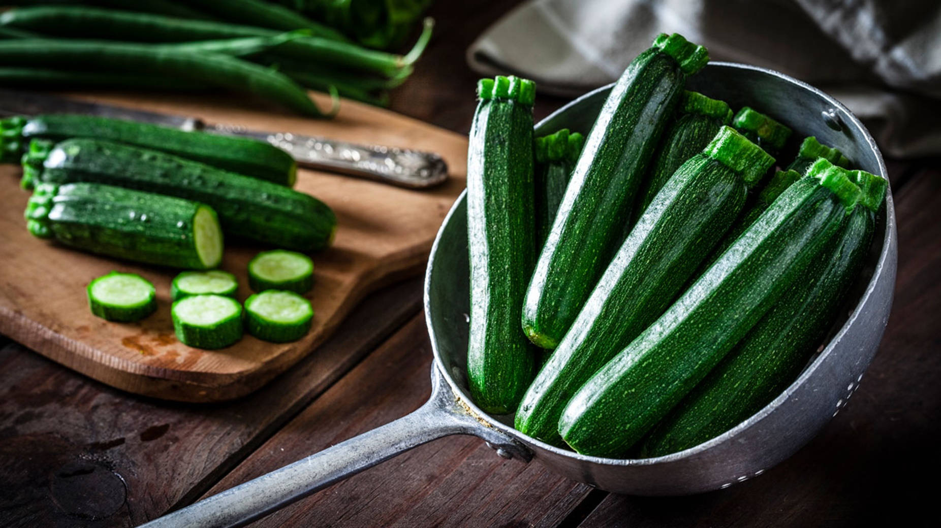 Zucchinis Blanched On A Metal Colander Background