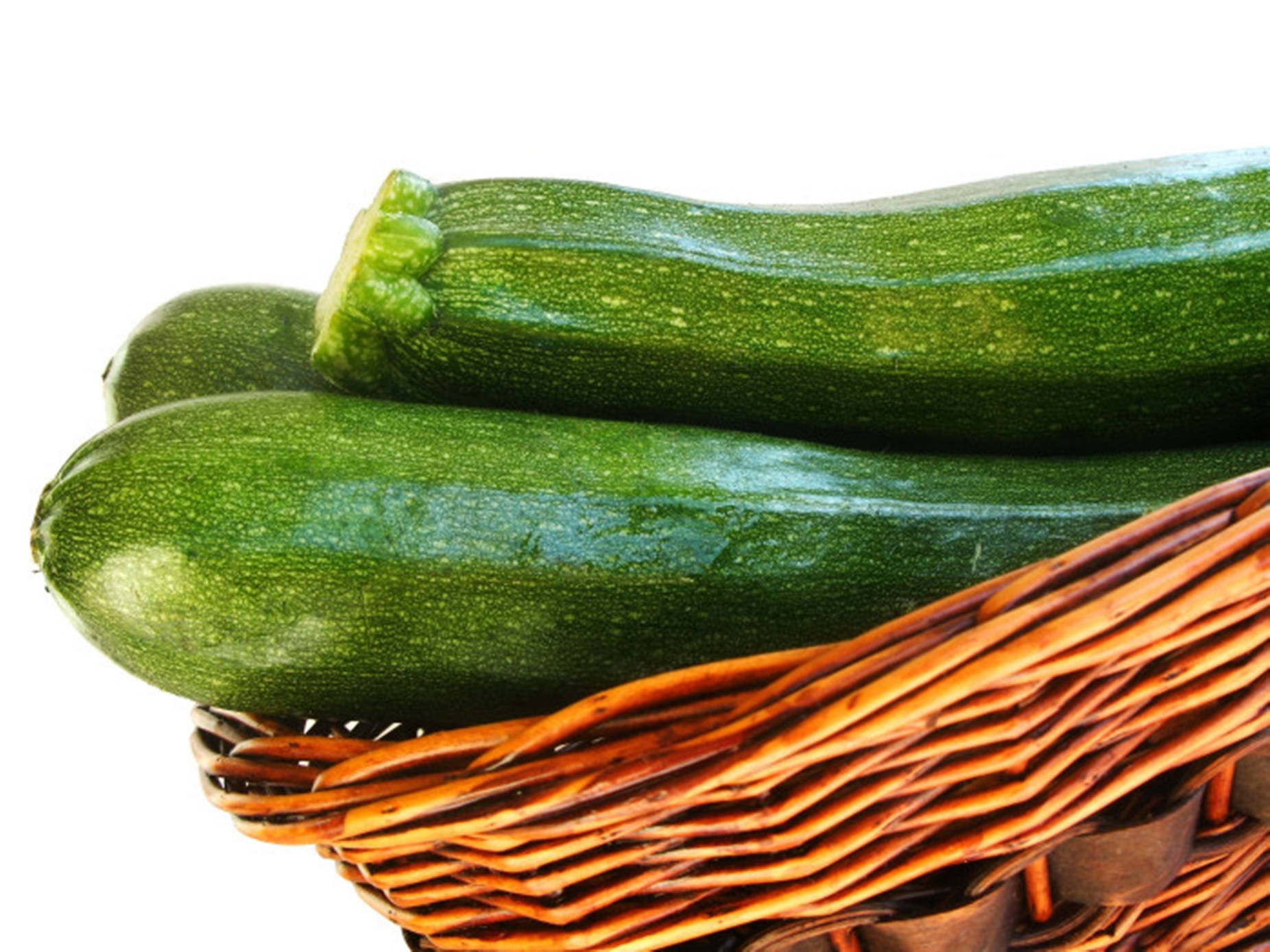 Zucchinis In A Woven Wicker Basket